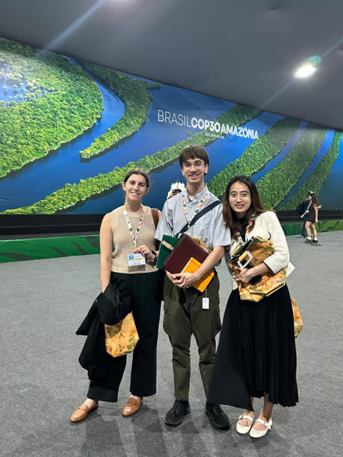 UChicago students Eliza Beckerman-Lee, Will Vanman and Claire Xie at the COP30 international climate conference in Brazil. 